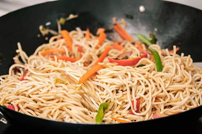Chinese food noodles with vegetables and mushrooms